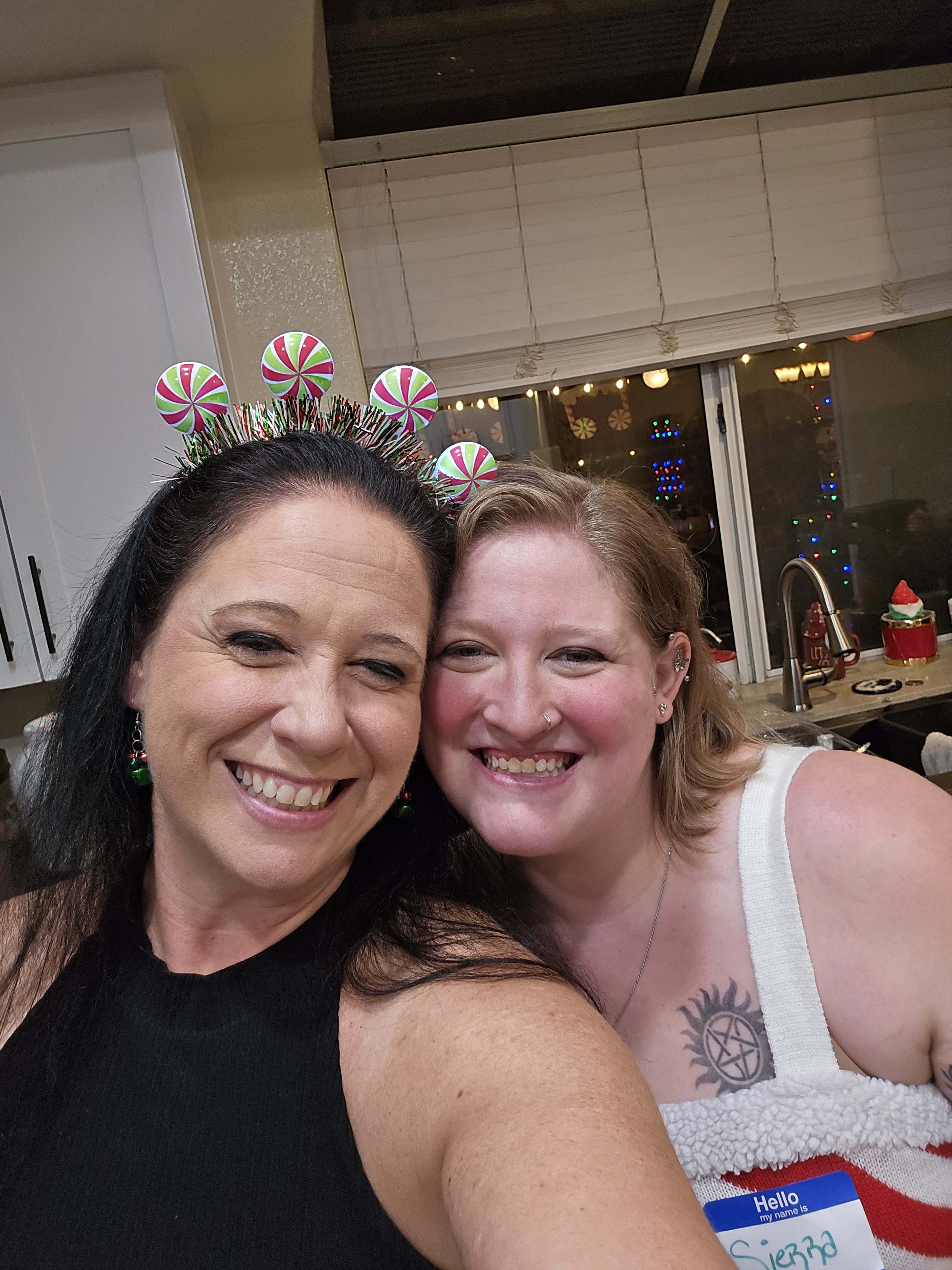 Friends sharing a Christmas evening at the Ladies Christmas Social