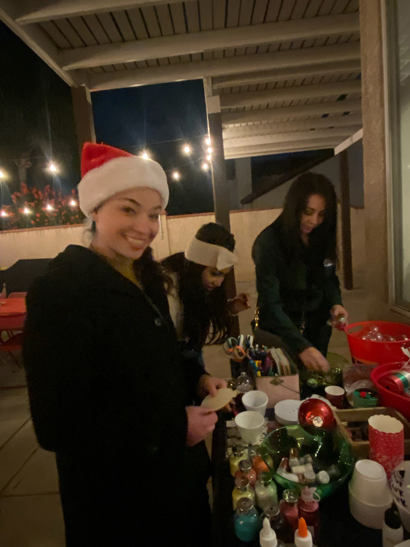 Guests preparing mugs and gifts for the Ladies Christmas Social mug exchange